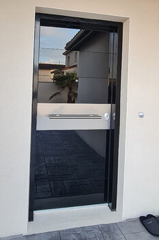 Security door with black glass